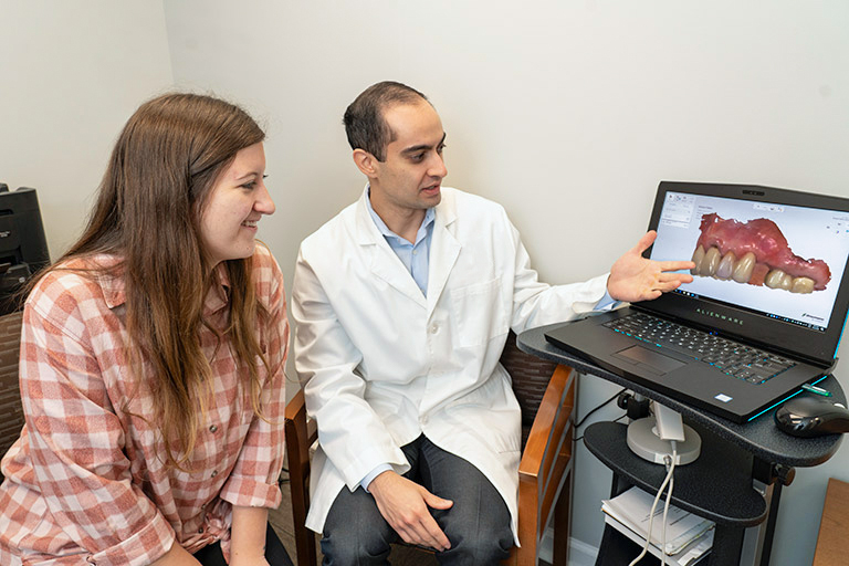 Doctor showing an scan to a patient
